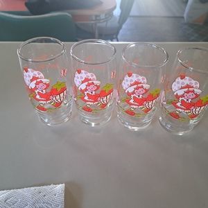 A set of four vintage Strawberry Shortcake glasses